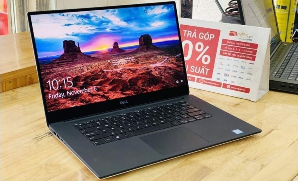 A close up photo of Dell XPS 15 on desk during our testing for best day trading laptops.